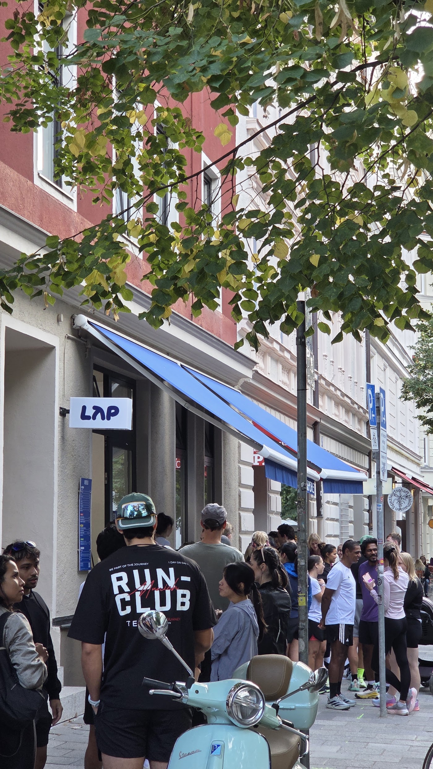 Leaving LAP Coffee. The pavement in Haidhausen was not built for this many runners.